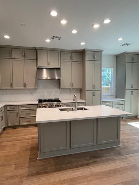 157 Haven Circle Pleasant Hill, CA 94523 - Photo 2 of 7 a kitchen with a sink cabinets and wooden floor