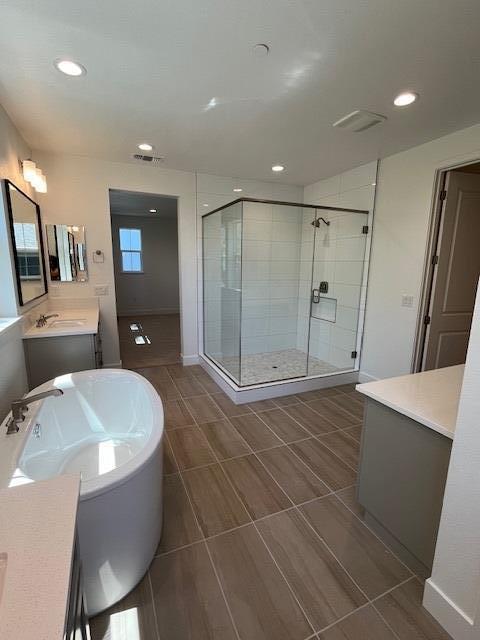 157 Haven Circle Pleasant Hill, CA 94523 - Photo 6 of 7 a spacious bathroom with a shower a sink and a mirror