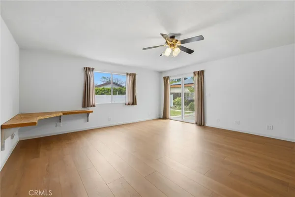 a view of room window and wooden floor