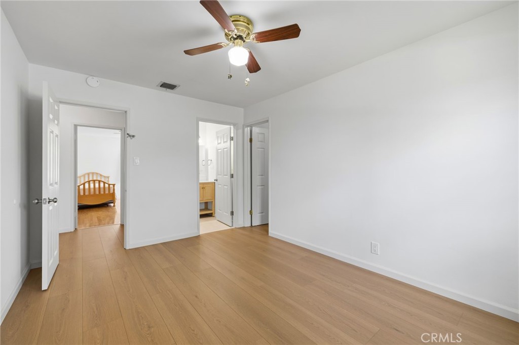 2407 North Keystone Street Burbank, CA 91504 - Photo 15 of 28 a view of a livingroom with a hardwood floor and a ceiling fan