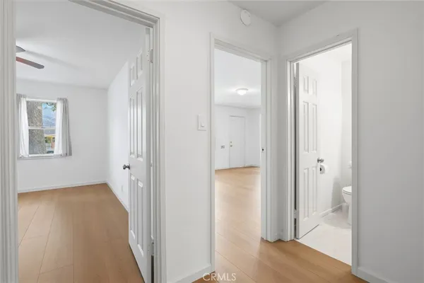 an empty room and wooden door