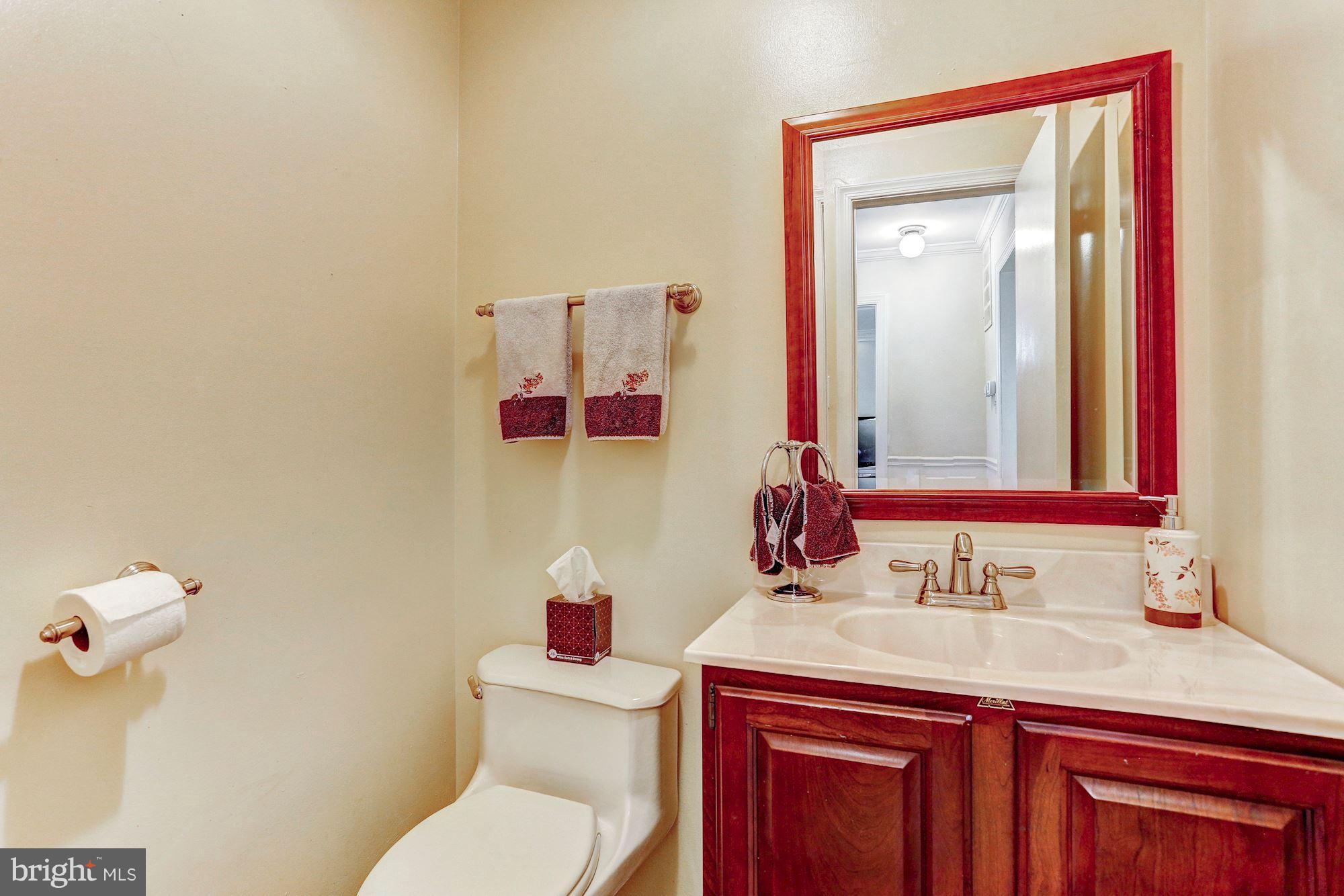 15005 Wellwood Road Silver Spring, MD 20905 - Photo 12 of 30 Half bath on main level