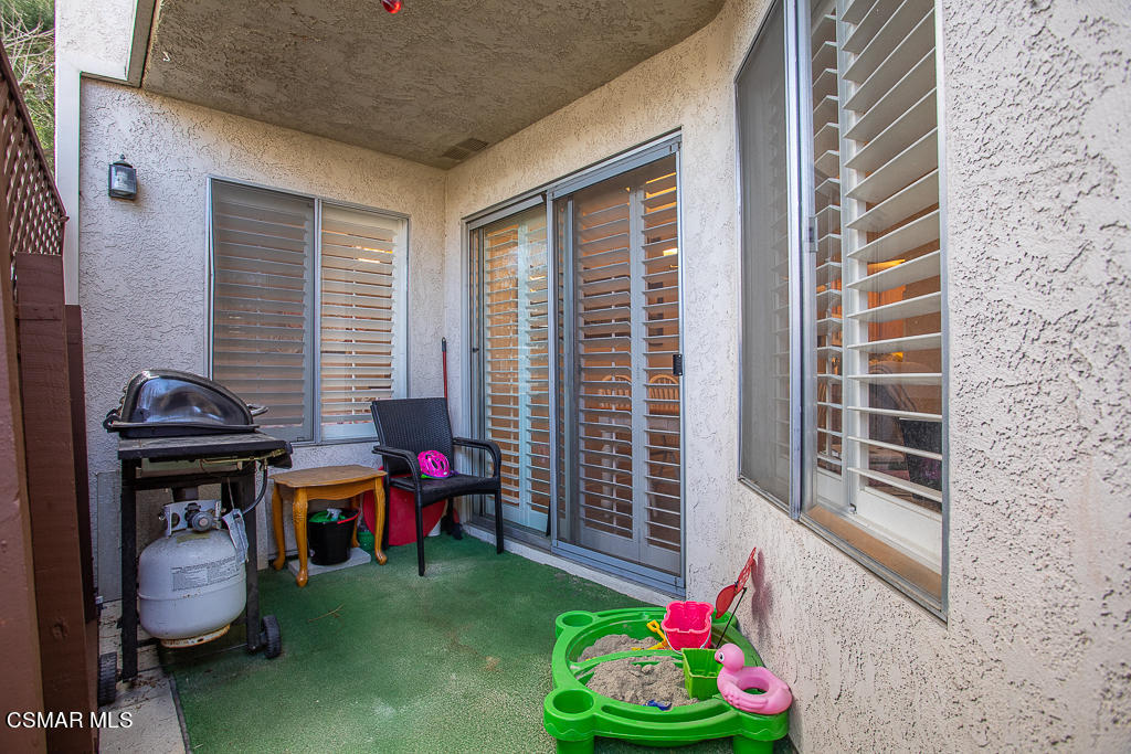 1772 Sinaloa Road, Unit 192 Simi Valley, CA 93065 - Photo 15 of 21 a backyard of a house with outdoor seating