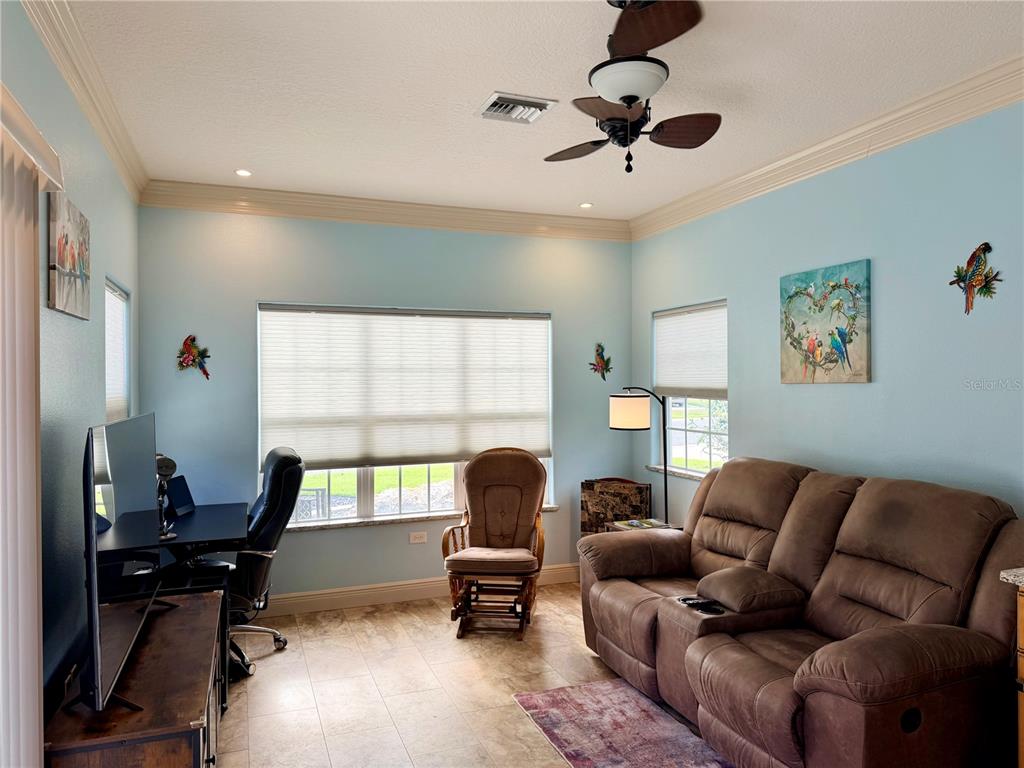 9357 Southeast 49th Terrace Webster, FL 33597 - Photo 15 of 39 a living room with furniture