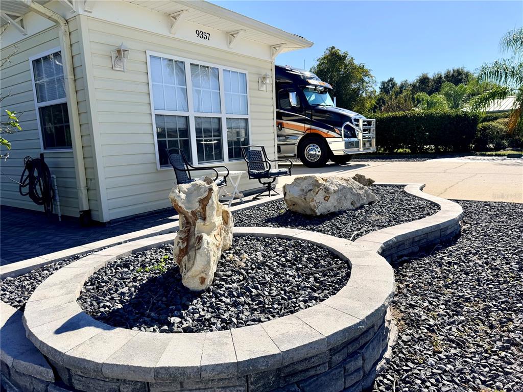 9357 Southeast 49th Terrace Webster, FL 33597 - Photo 4 of 39 a kitchen with a sink a stove and a wooden floors