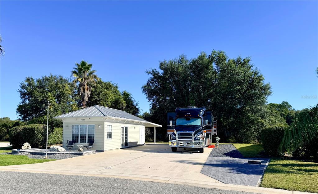 9357 Southeast 49th Terrace Webster, FL 33597 - Photo 6 of 39 a view of a house with outdoor space and sitting area