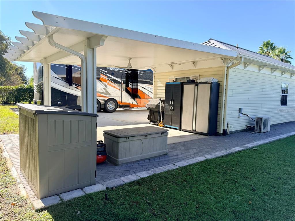 9357 Southeast 49th Terrace Webster, FL 33597 - Photo 9 of 39 a view of back yard of the house