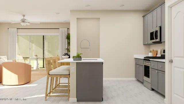 a view of a dining room with furniture and a window