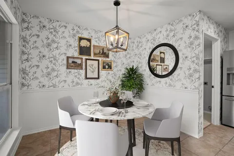 a dining room with furniture a rug and a clock