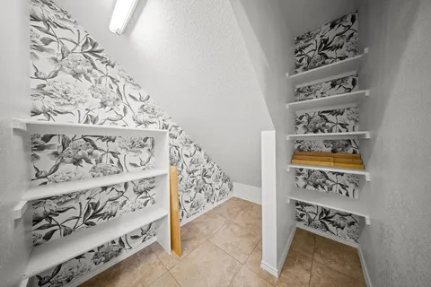 a view of a entryway with wooden floor