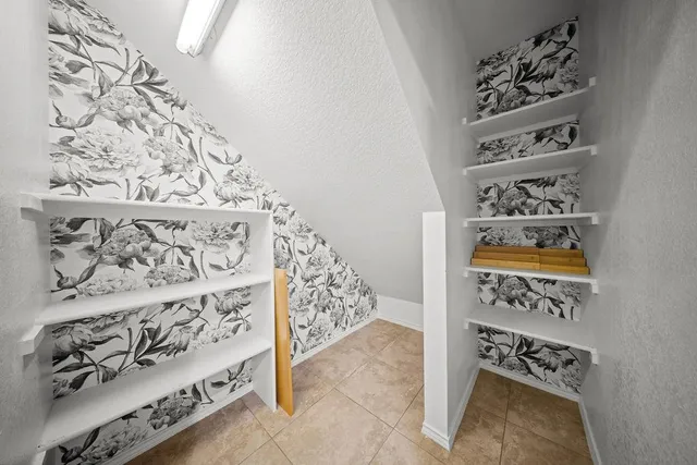 a view of a entryway with wooden floor