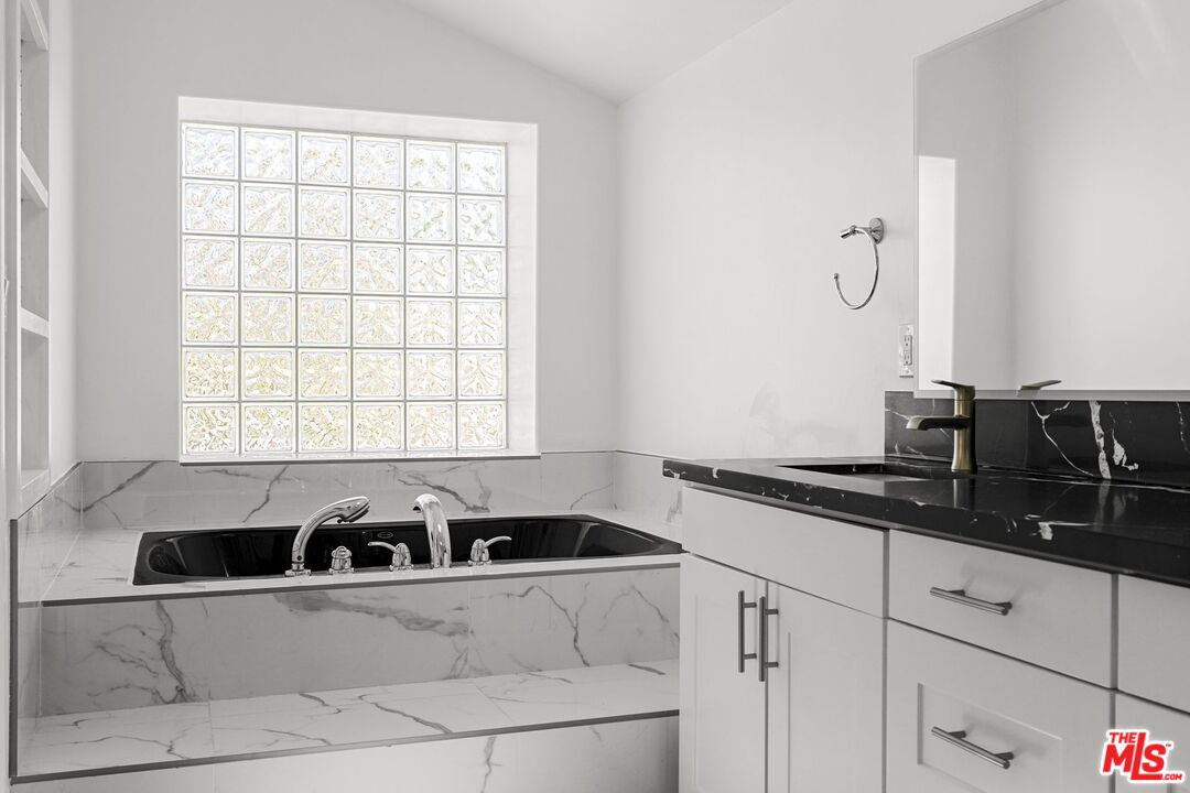 18657 Kirkcolm Lane Porter Ranch, CA 91326 - Photo 14 of 22 a view of a kitchen counter space and window