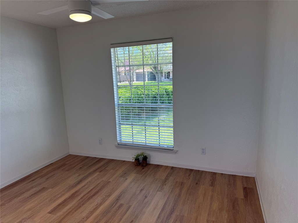 7313 Rhett Place Austin, TX 78744 - Photo 20 of 38 an empty room with a window