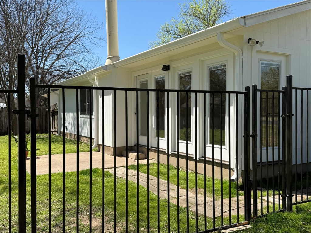7313 Rhett Place Austin, TX 78744 - Photo 24 of 38 a view of a black gate