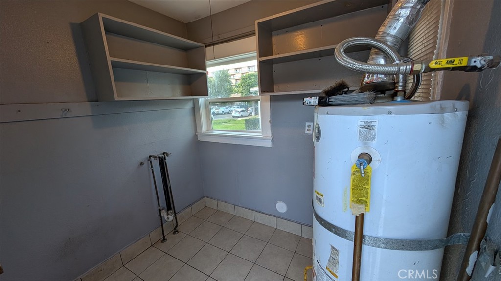 3445 4th Street Riverside, CA 92501 - Photo 15 of 20 a view of storage and utility room with washer and dryer