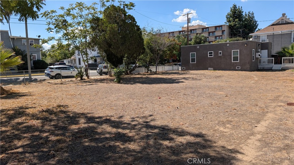 3445 4th Street Riverside, CA 92501 - Photo 18 of 20 a view of the house with a yard