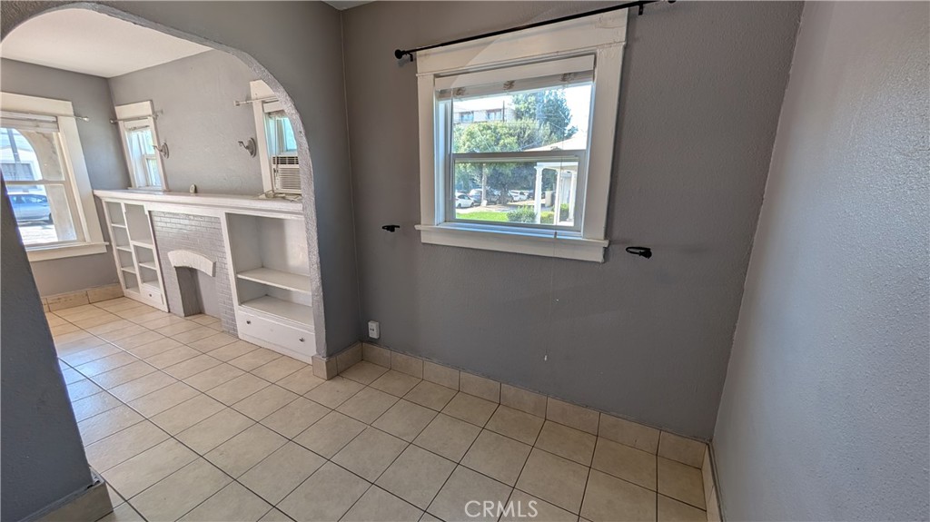 3445 4th Street Riverside, CA 92501 - Photo 8 of 20 a view of a livingroom with furniture and windows
