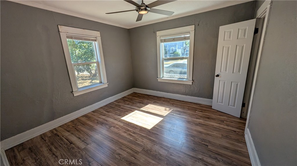 3445 4th Street Riverside, CA 92501 - Photo 10 of 20 a view of wooden floor and windows in a room