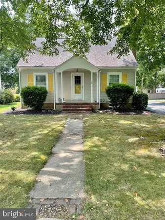a front view of a house with a patio