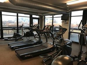 1070 West 15th Street, Unit 112 Chicago, IL 60608 - Photo 21 of 29 a view of a room with gym equipment