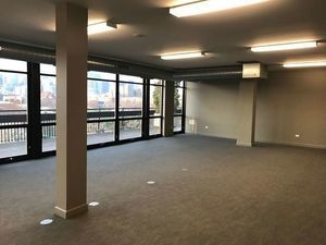 1070 West 15th Street, Unit 112 Chicago, IL 60608 - Photo 22 of 29 a view of an empty room with a balcony