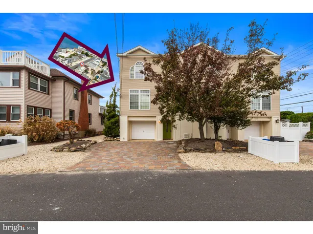 a view of a house with a street