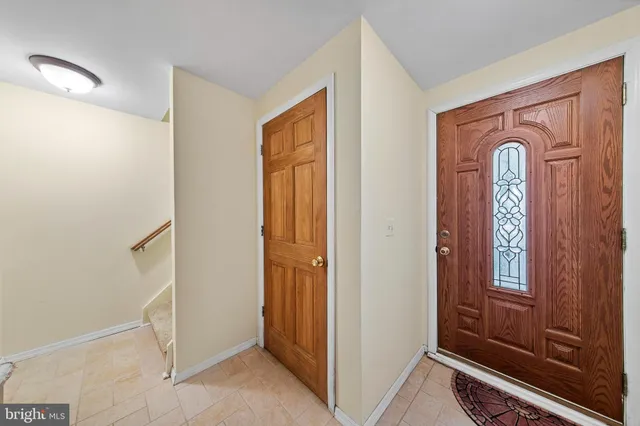 a view of a house with a tree