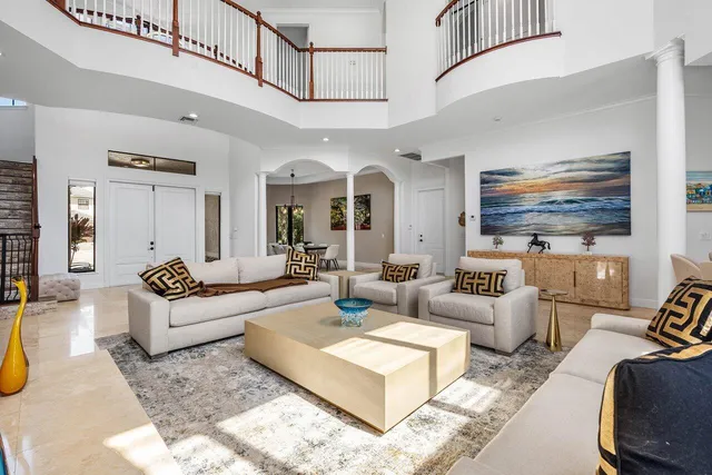 a view of entryway and hall with a front door