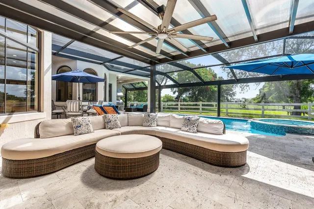 a view of a swimming pool with a porch