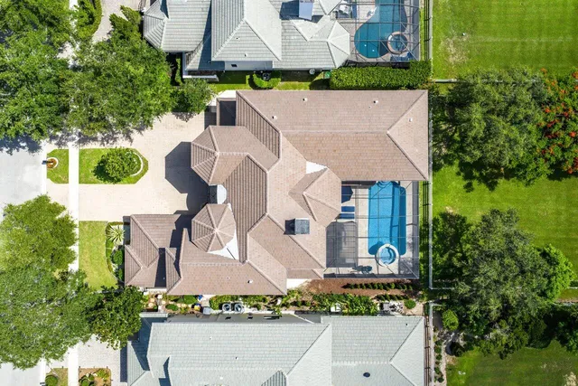 a view of a golf course with a lake