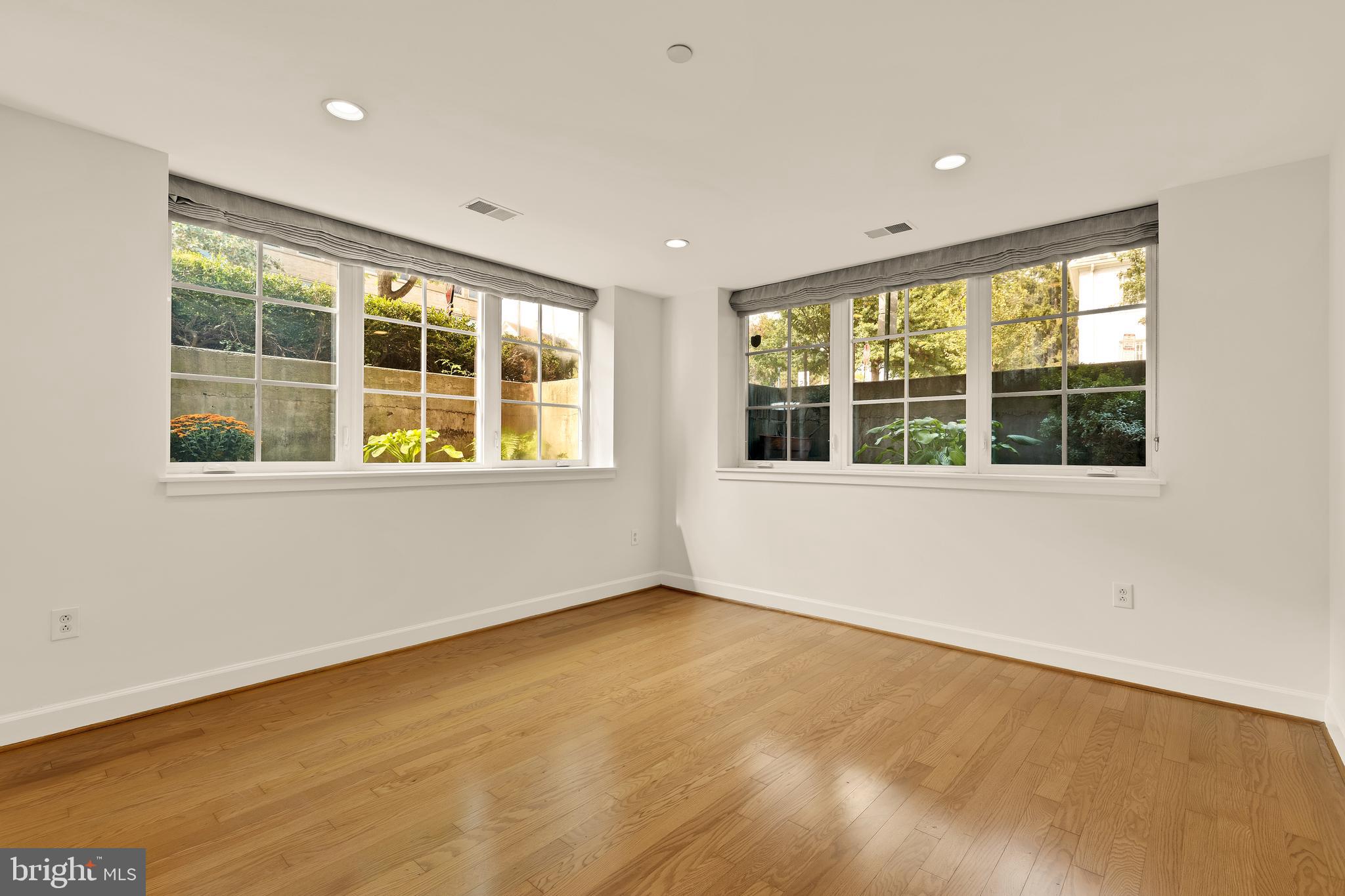 150 V Street Northwest, Unit VL02 Washington, DC 20001 - Photo 4 of 18 a view of an empty room with a window