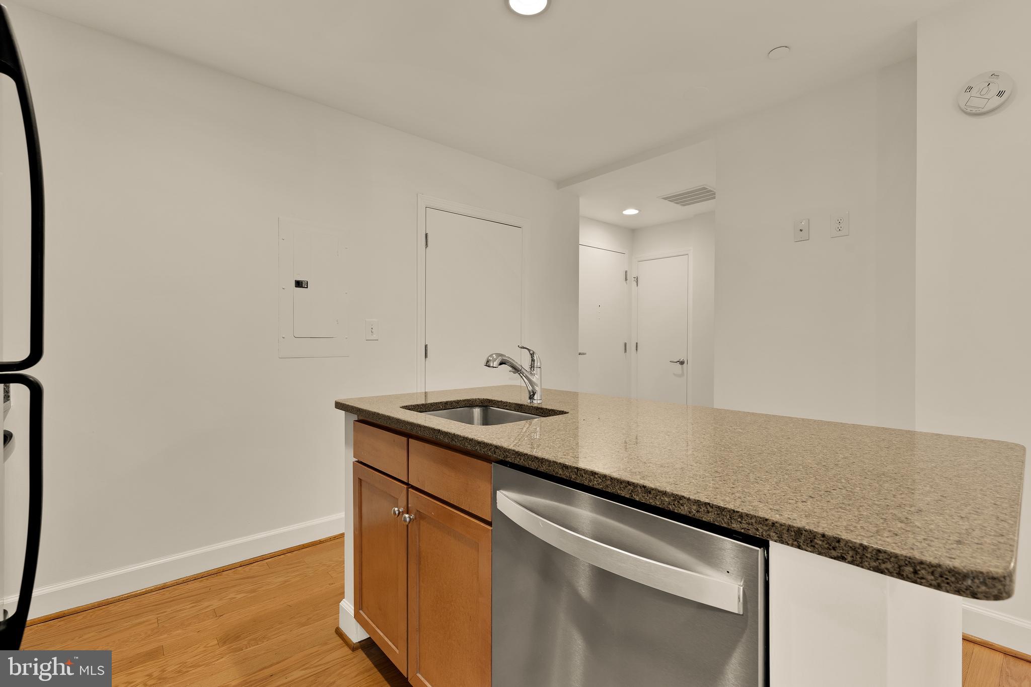 150 V Street Northwest, Unit VL02 Washington, DC 20001 - Photo 7 of 18 a room with a sink and cabinets