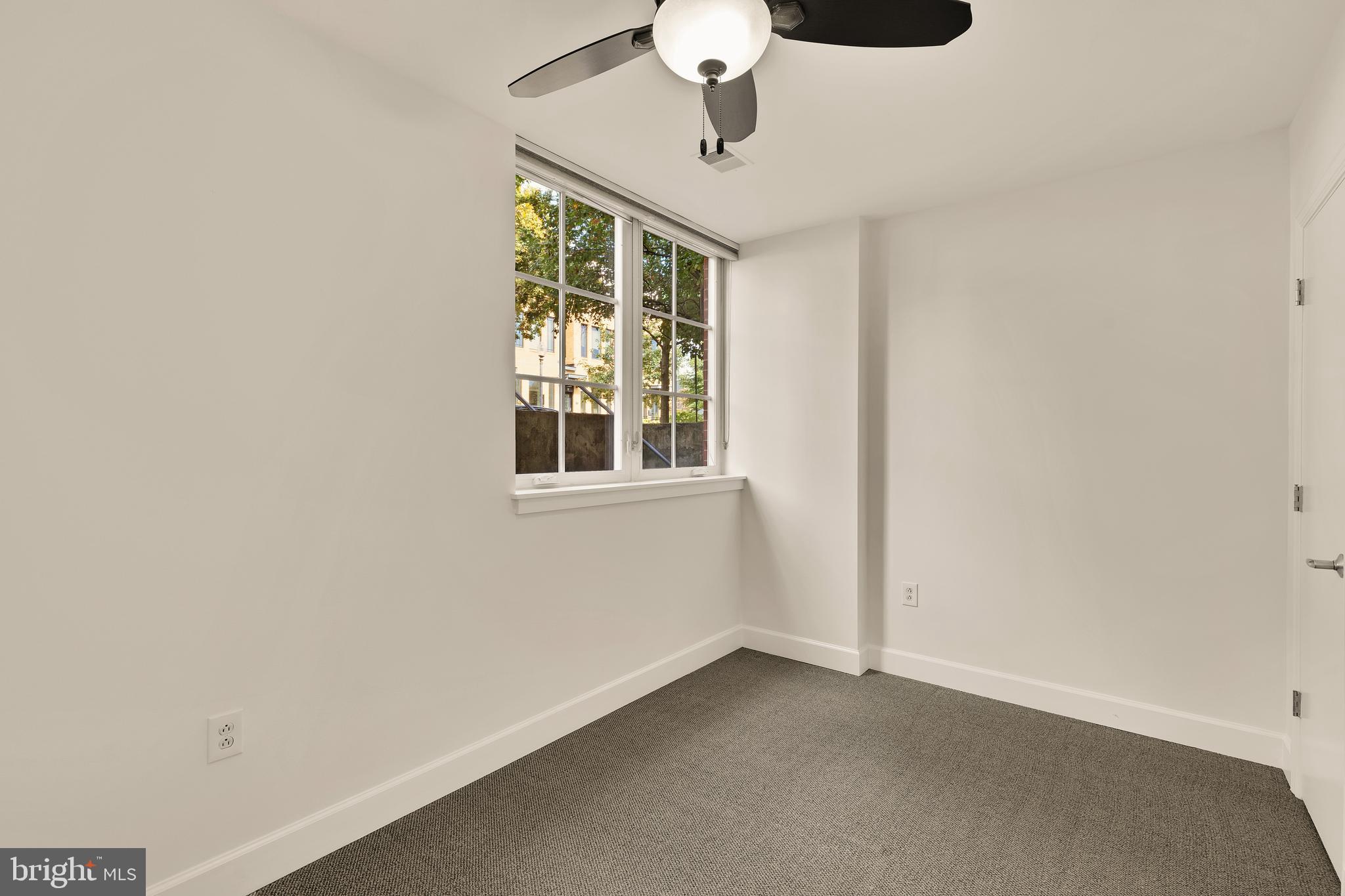 150 V Street Northwest, Unit VL02 Washington, DC 20001 - Photo 10 of 18 a view of an empty room with a window