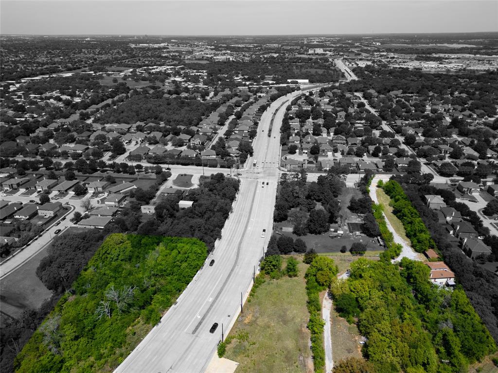 2900 Robinson Road Denton, TX 76210 - Photo 28 of 33 Expansive parcel featuring mature trees bordering a multi-lane roadway