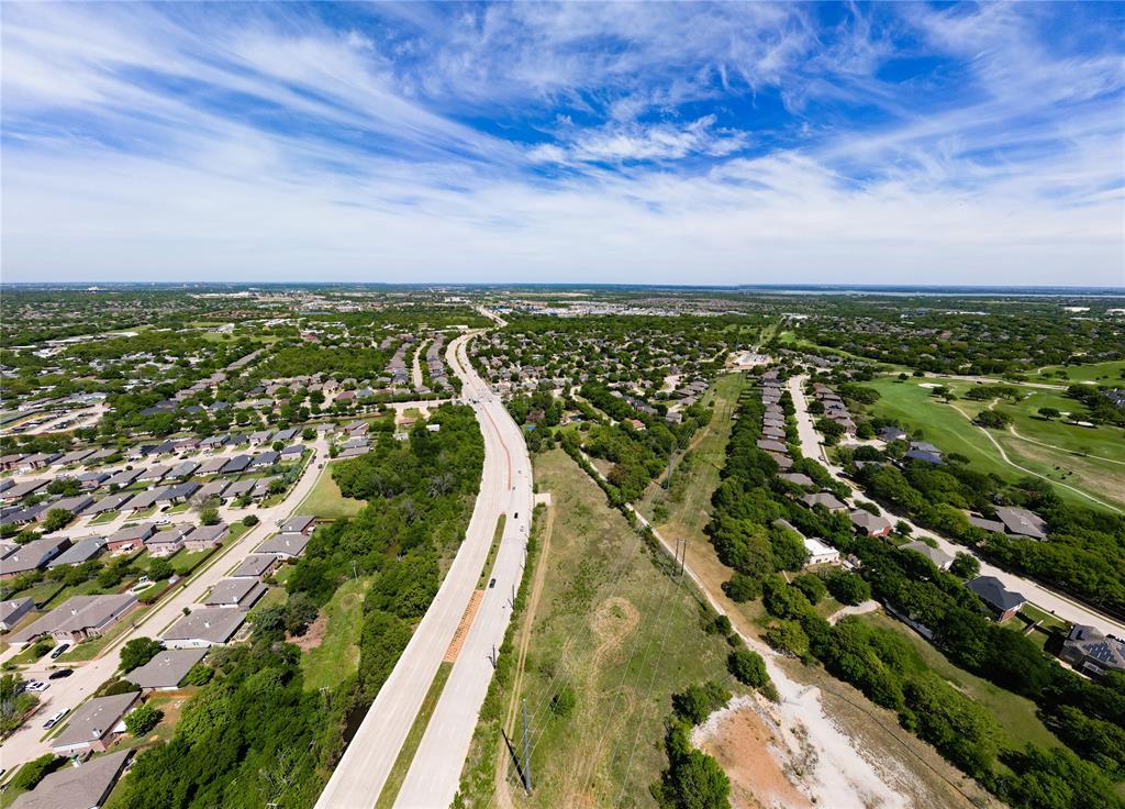 2900 Robinson Road Denton, TX 76210 - Photo 33 of 33 Aerial perspective showcasing a residential area with extensive tree coverage