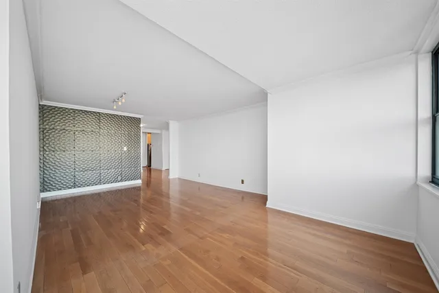 a kitchen with a stove and a refrigerator