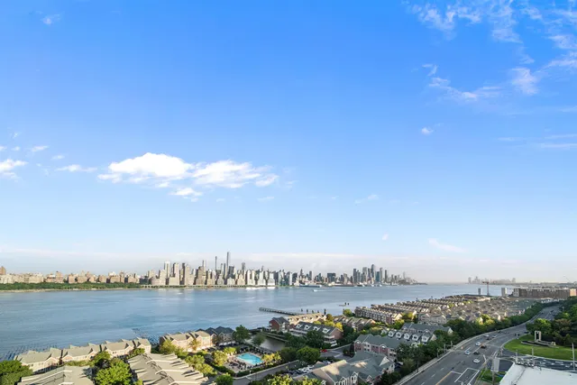 a view of a city with ocean view