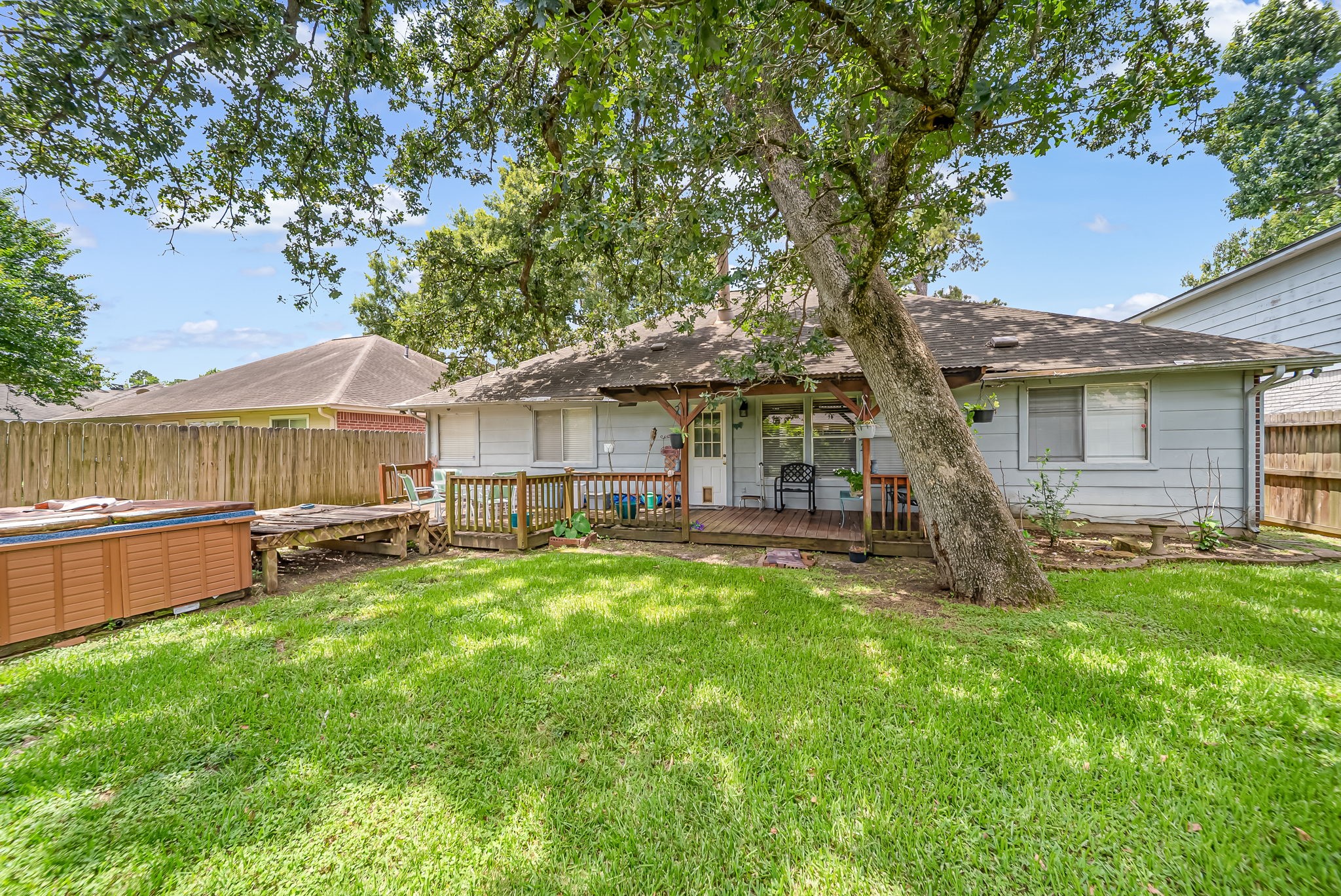 22906 Prairie Bird Lane Spring, TX 77373 - Photo 2 of 14 a view of a house with a yard and sitting area