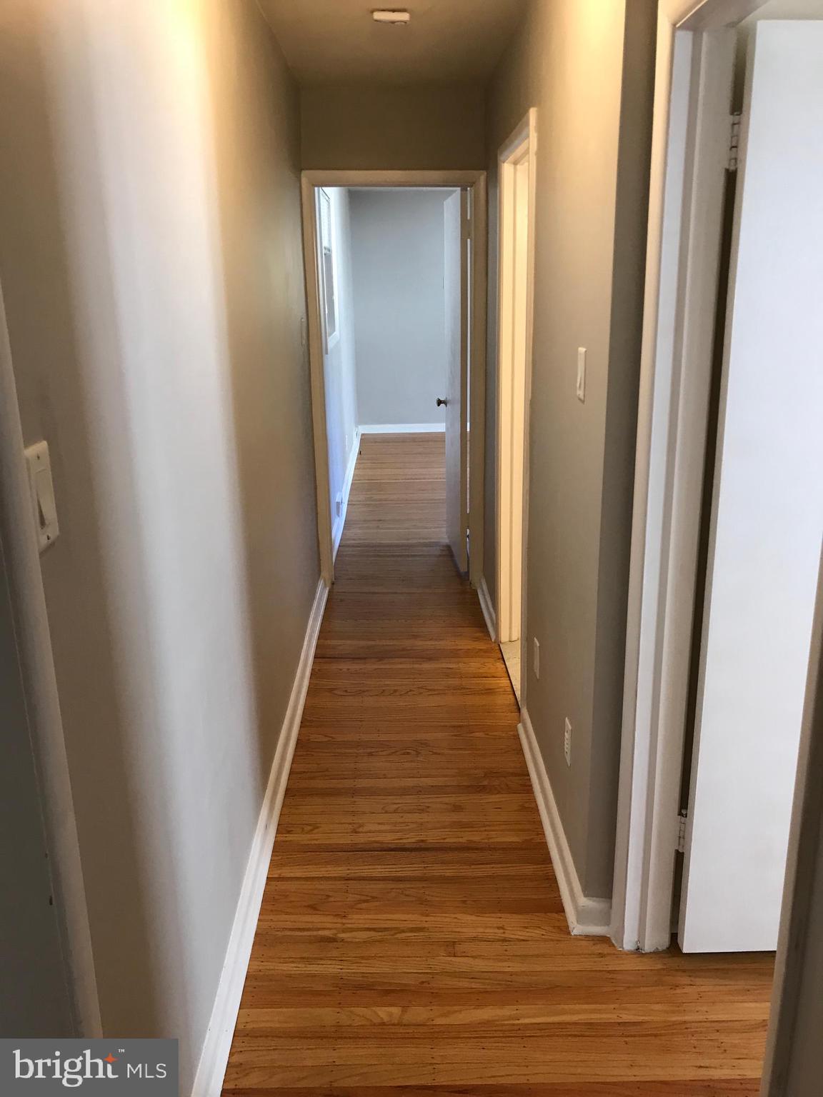 720 Yale Road Bala Cynwyd, PA 19004 - Photo 14 of 25 a view of a hallway with wooden floor