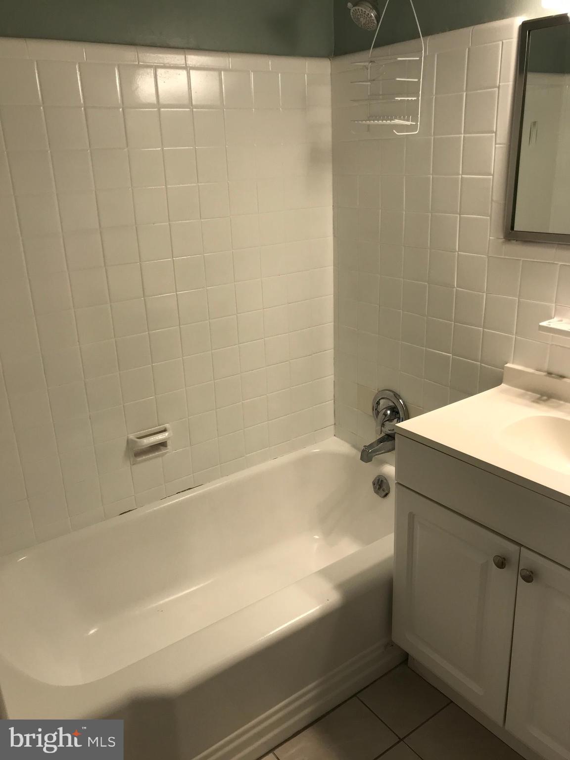 720 Yale Road Bala Cynwyd, PA 19004 - Photo 17 of 25 a bathroom with a bathtub and a sink
