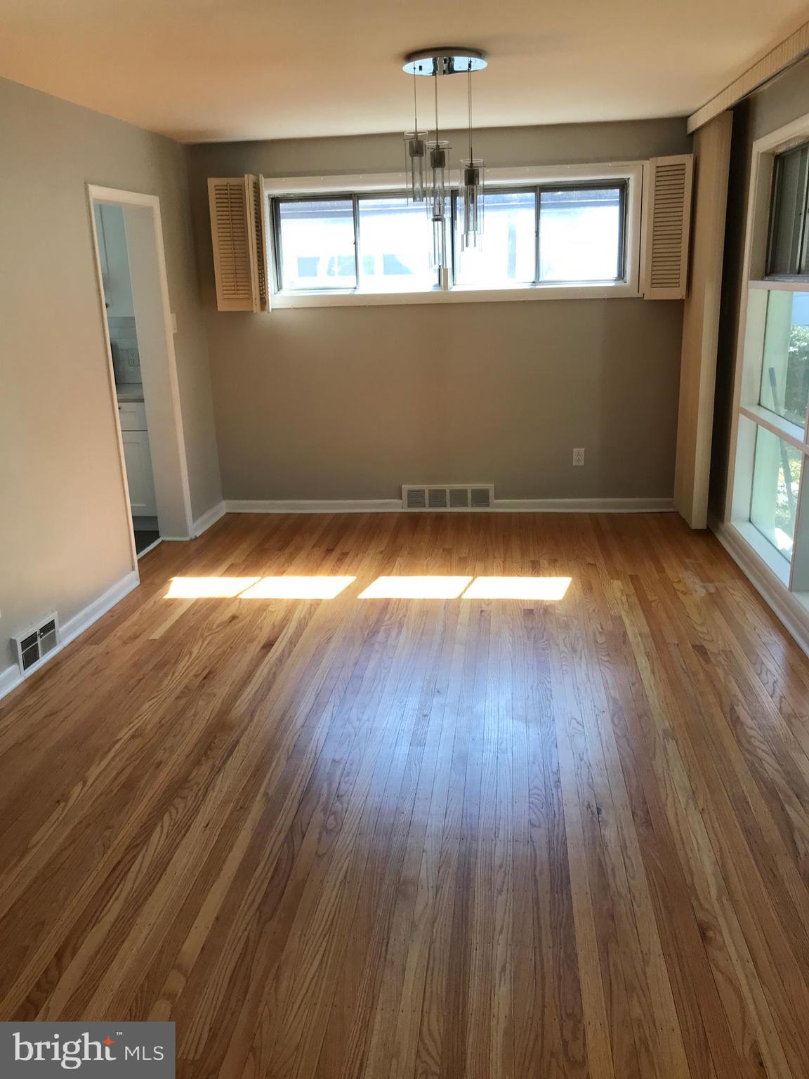 720 Yale Road Bala Cynwyd, PA 19004 - Photo 6 of 25 wooden floor in an empty room with a window