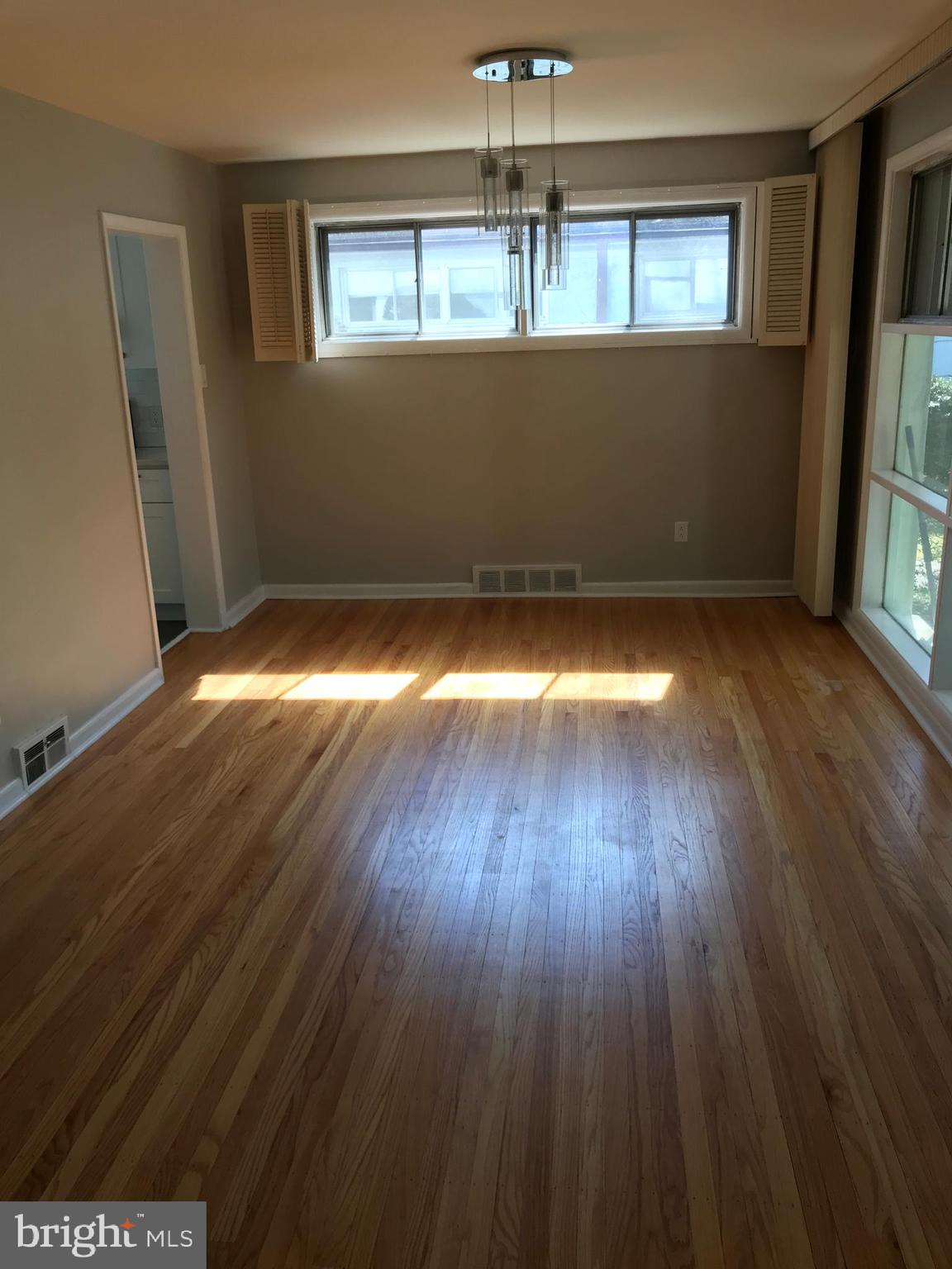 720 Yale Road Bala Cynwyd, PA 19004 - Photo 7 of 25 wooden floor in an empty room with a window