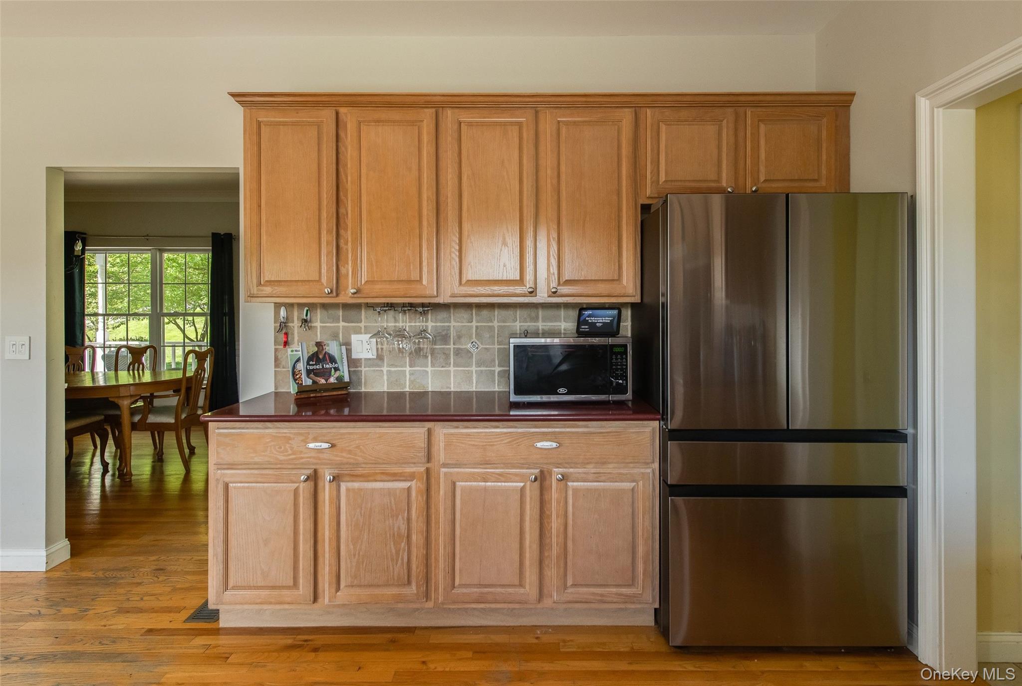 66 Gretna Road Pleasant Valley, NY 12569 - Photo 15 of 37 a kitchen with a refrigerator and a stove top oven