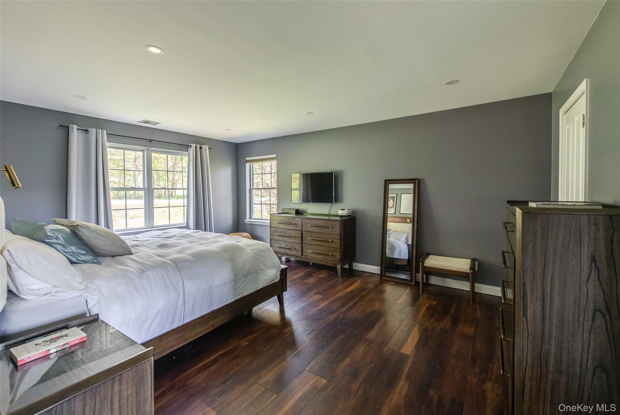 66 Gretna Road Pleasant Valley, NY 12569 - Photo 20 of 37 a bedroom with a bed and wooden floor