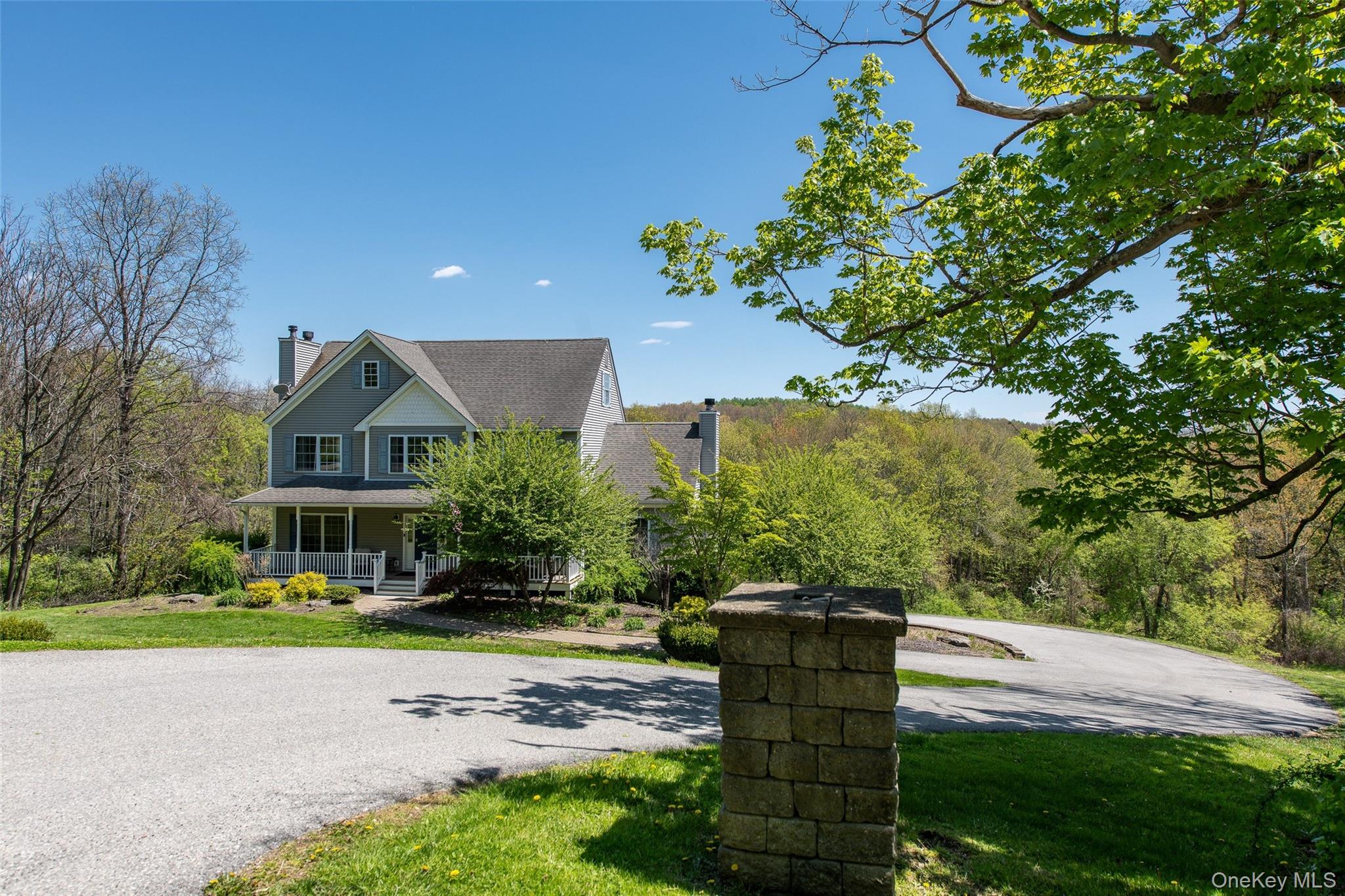 66 Gretna Road Pleasant Valley, NY 12569 - Photo 2 of 37 a front view of a house with a yard