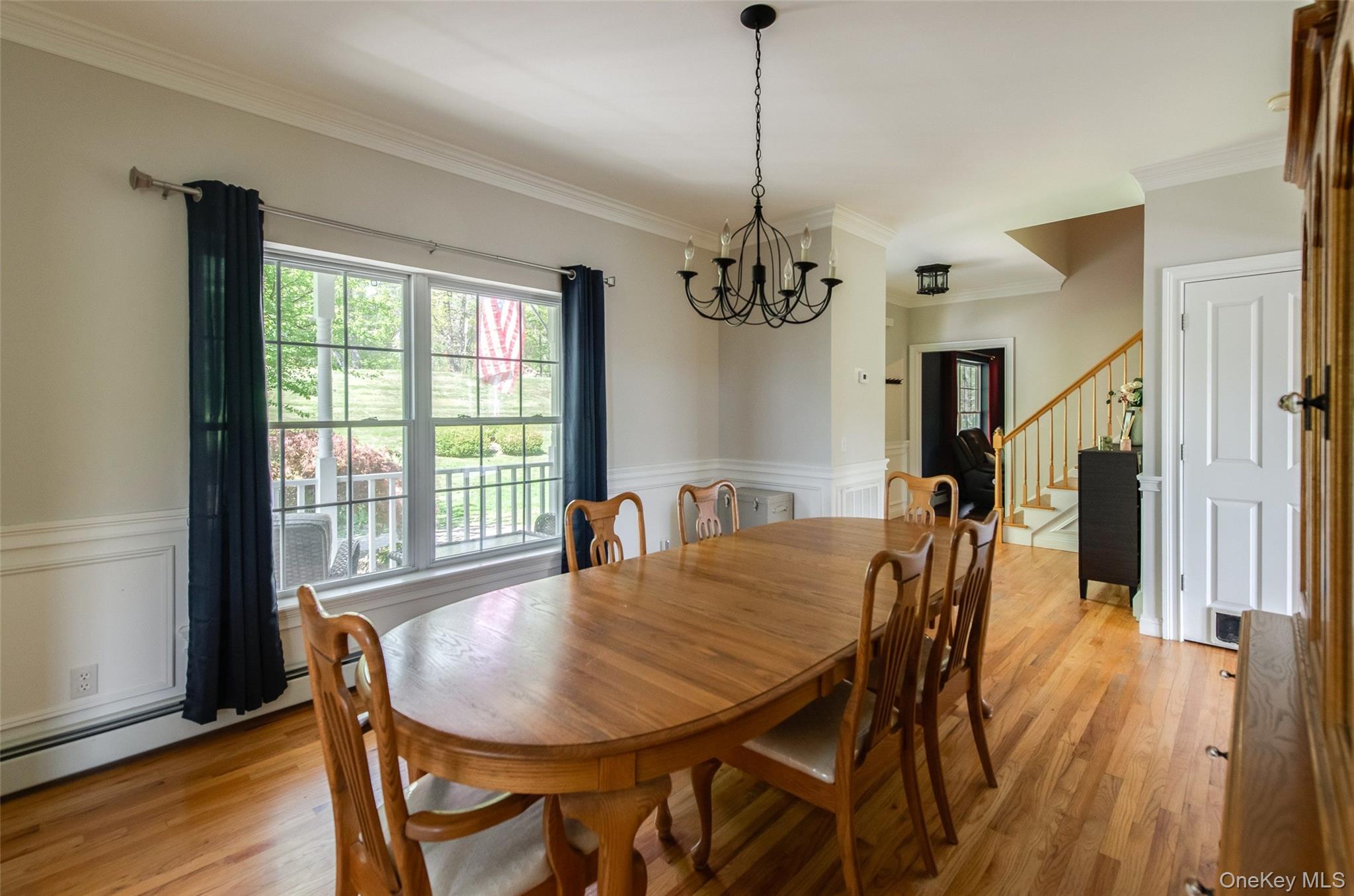 66 Gretna Road Pleasant Valley, NY 12569 - Photo 9 of 37 a view of a dining room with furniture window and wooden floor