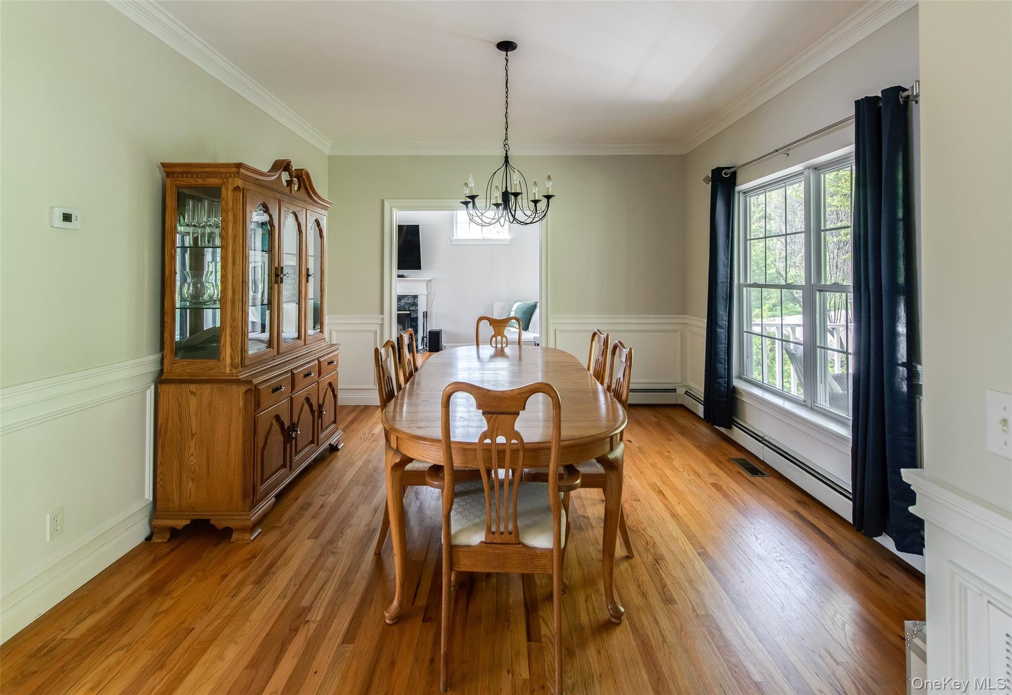 66 Gretna Road Pleasant Valley, NY 12569 - Photo 10 of 37 a view of a dining room with furniture window and wooden floor