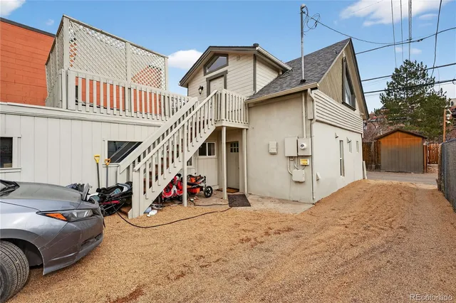 a view of a house with a flat tv screen