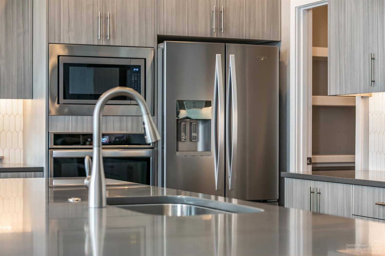 63120 Iner Loop Bend, OR 97701 - Photo 9 of 25 Double Oven, Stainless Steel Appliances, comes with Refrigerator. Pictures are of a similar home.