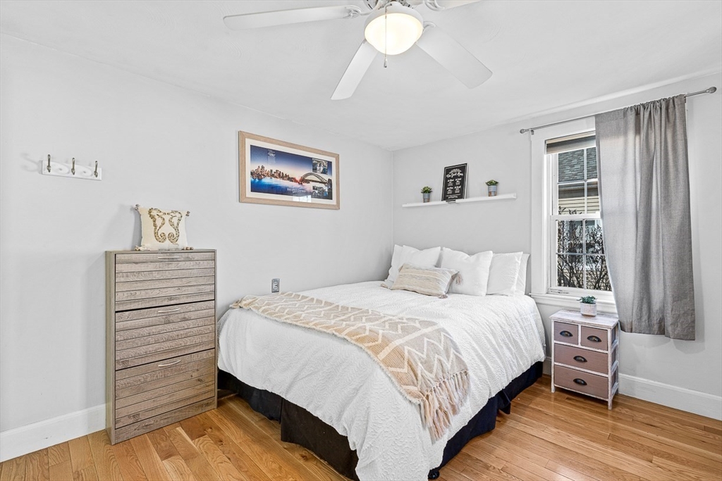80 Neal Street Malden, MA 02148 - Photo 16 of 39 a bedroom with a bed and a window